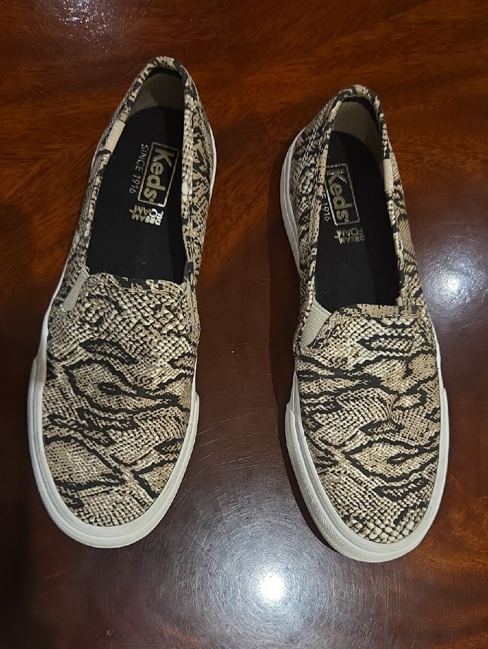 Keds Slip-On Sneakers in Beige and Black Snake Print
